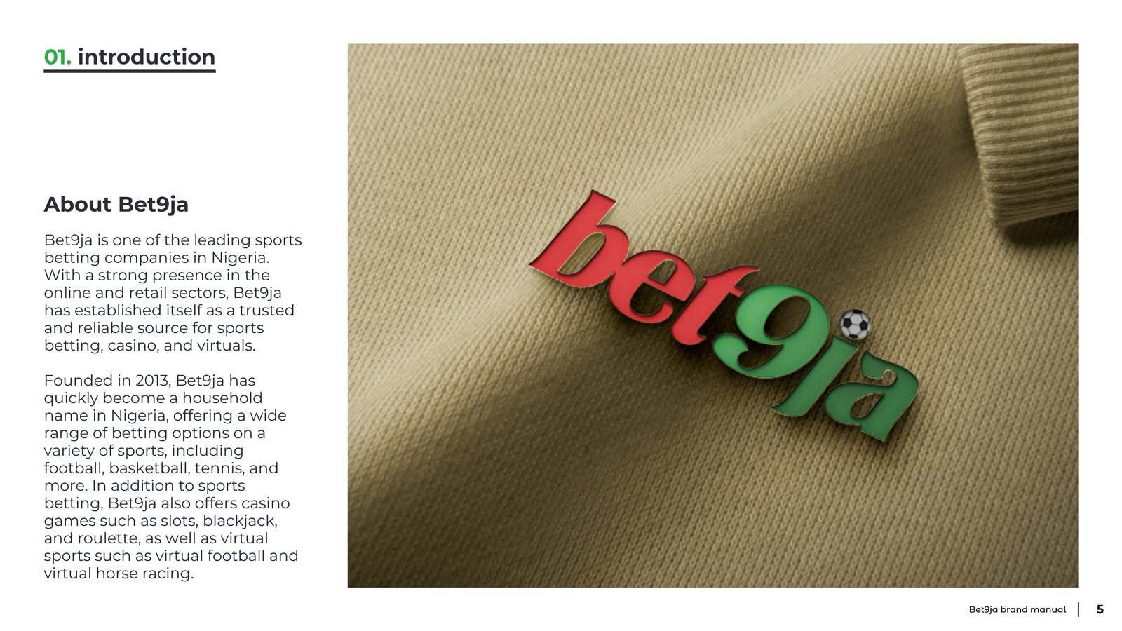The Bet9ja logo as a raised red and green sign on a stone wall